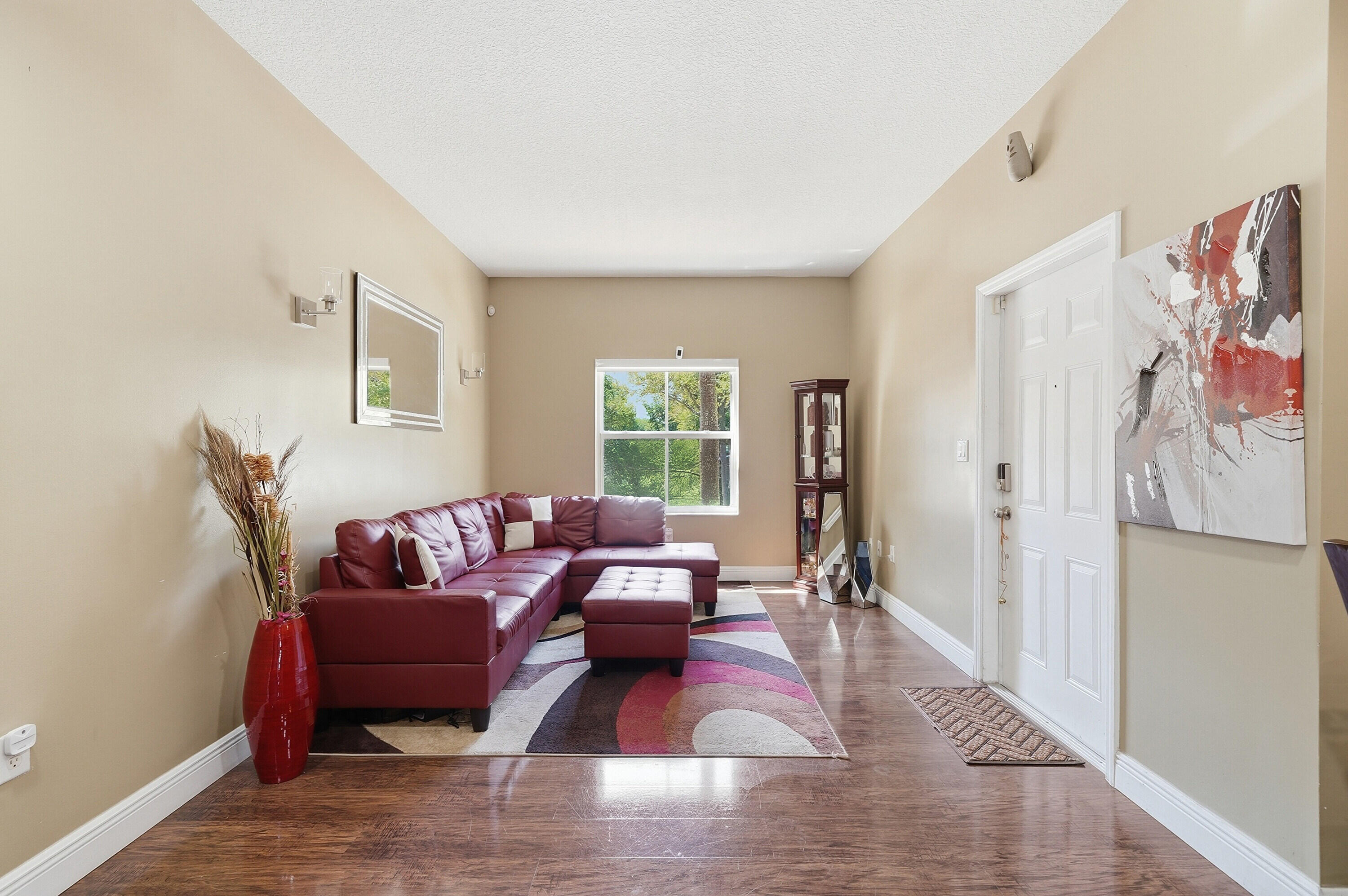 5825 Siena Lane Hollywood, FL 33021 - Photo 8 of 26 a living room with furniture window and a wooden floor
