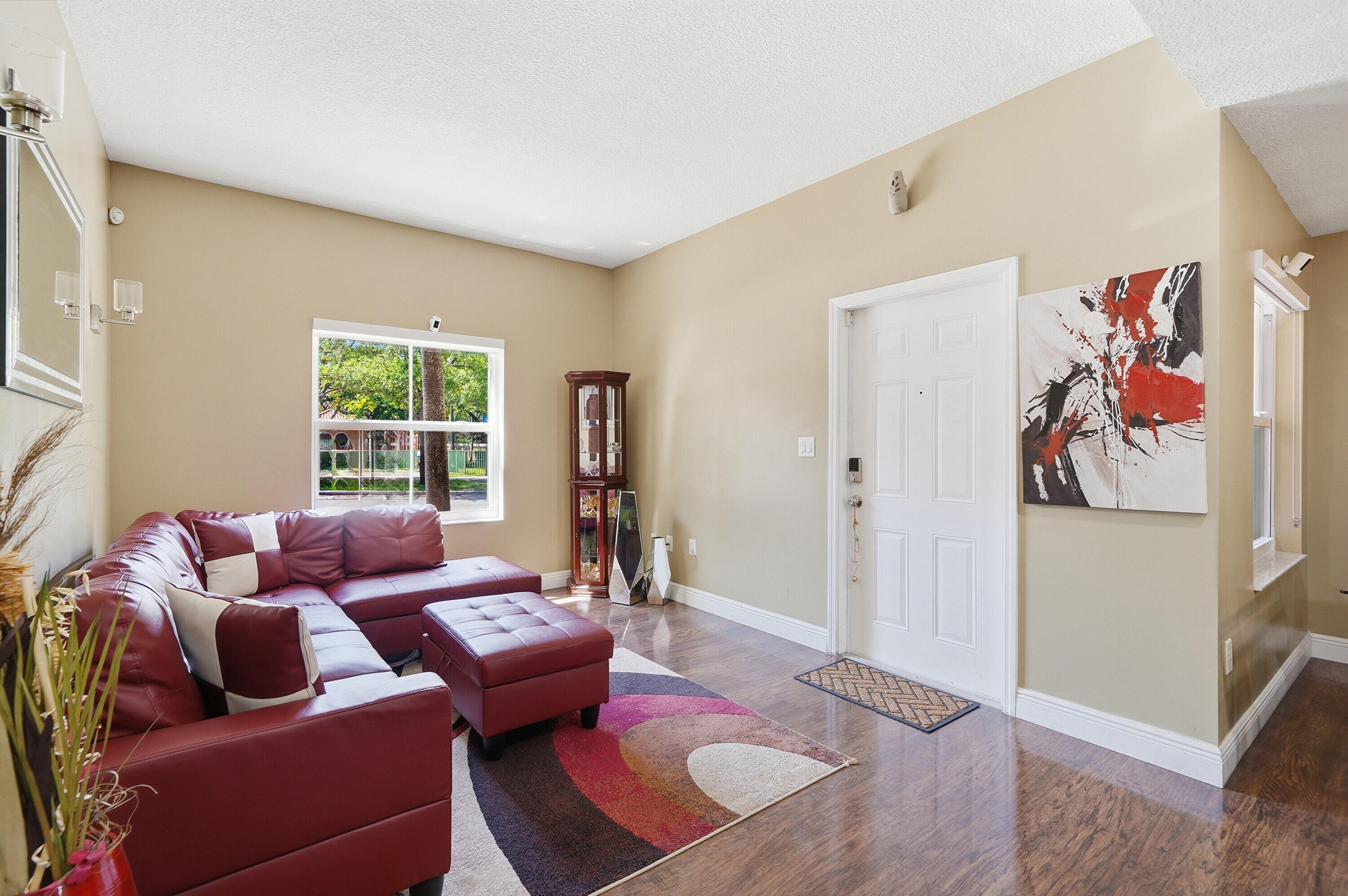5825 Siena Lane Hollywood, FL 33021 - Photo 9 of 26 a living room with furniture and a window