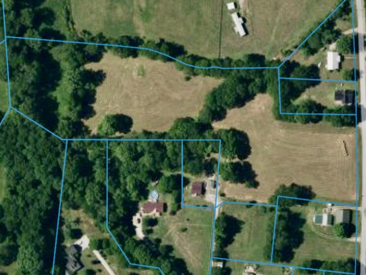 0 Fly Road Santa Fe, TN 38482 - Photo 1 of 3 an aerial view of lake and houses with outdoor space