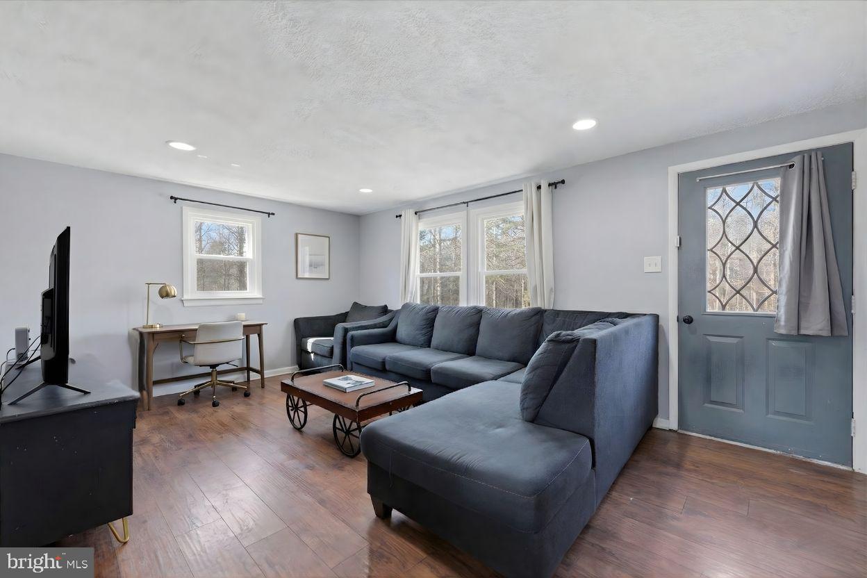 8513 Pamunkey Road Spotsylvania, VA 22551 - Photo 4 of 15 a living room with furniture and a window