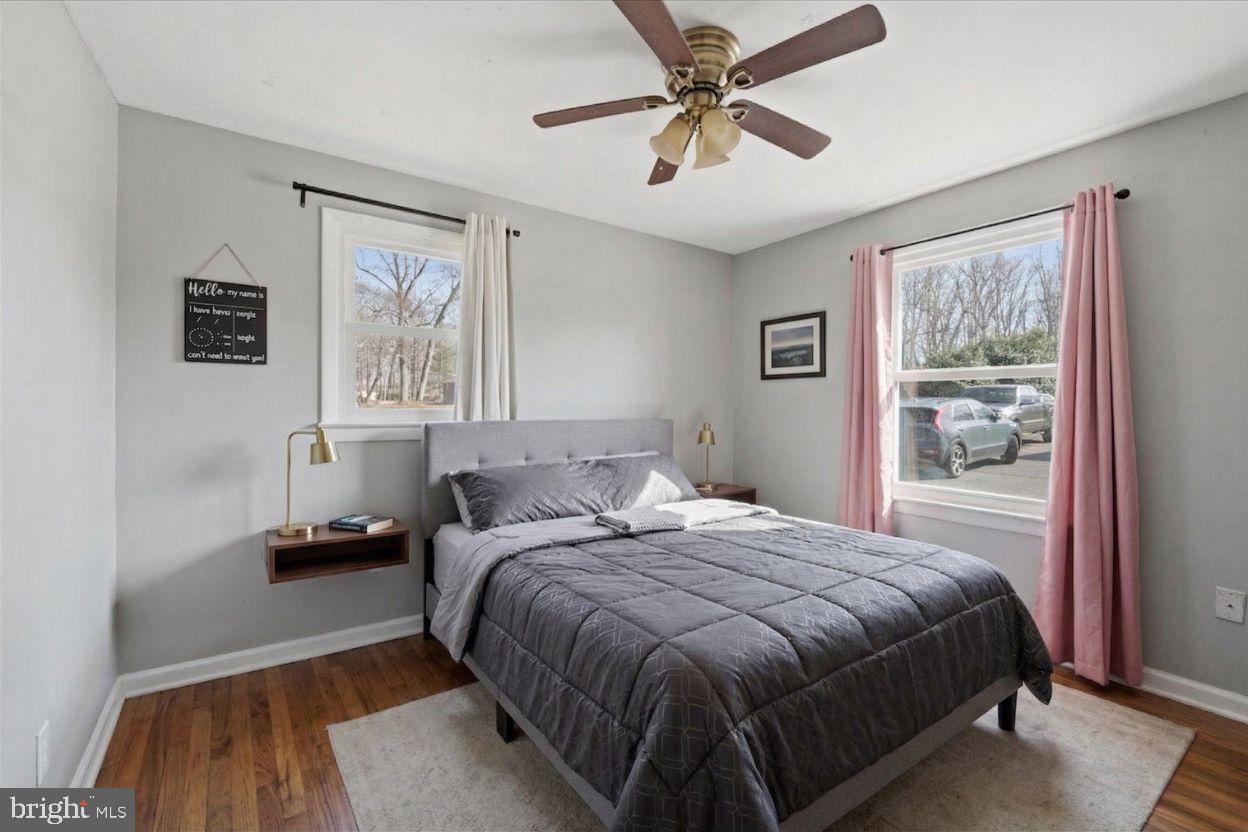 8513 Pamunkey Road Spotsylvania, VA 22551 - Photo 7 of 15 a bedroom with a large bed and a window