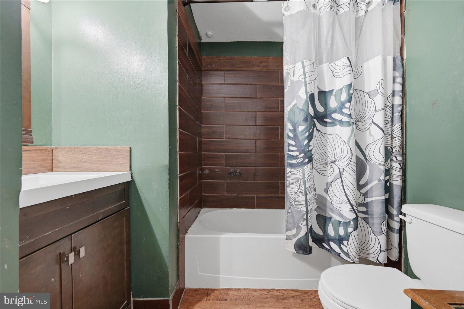 8513 Pamunkey Road Spotsylvania, VA 22551 - Photo 9 of 15 a bathroom with a bathtub and shower