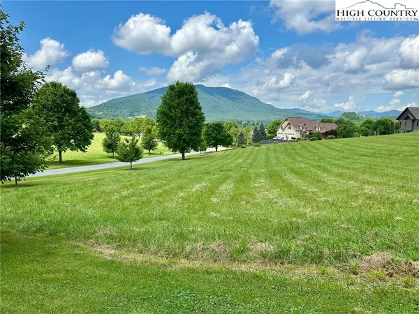 a view of field with green space
