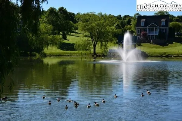 a view of a lake with a park