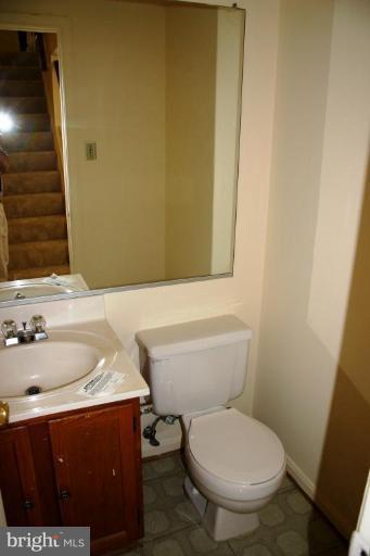 10398 Bermuda Lane Manassas, VA 20109 - Photo 4 of 7 a bathroom with a sink and a toilet