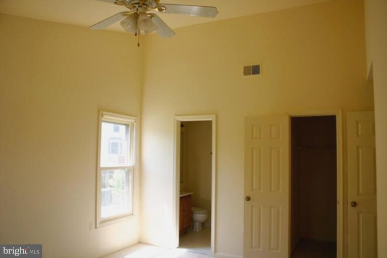 10398 Bermuda Lane Manassas, VA 20109 - Photo 7 of 7 a view of a bathroom with a shower and a window
