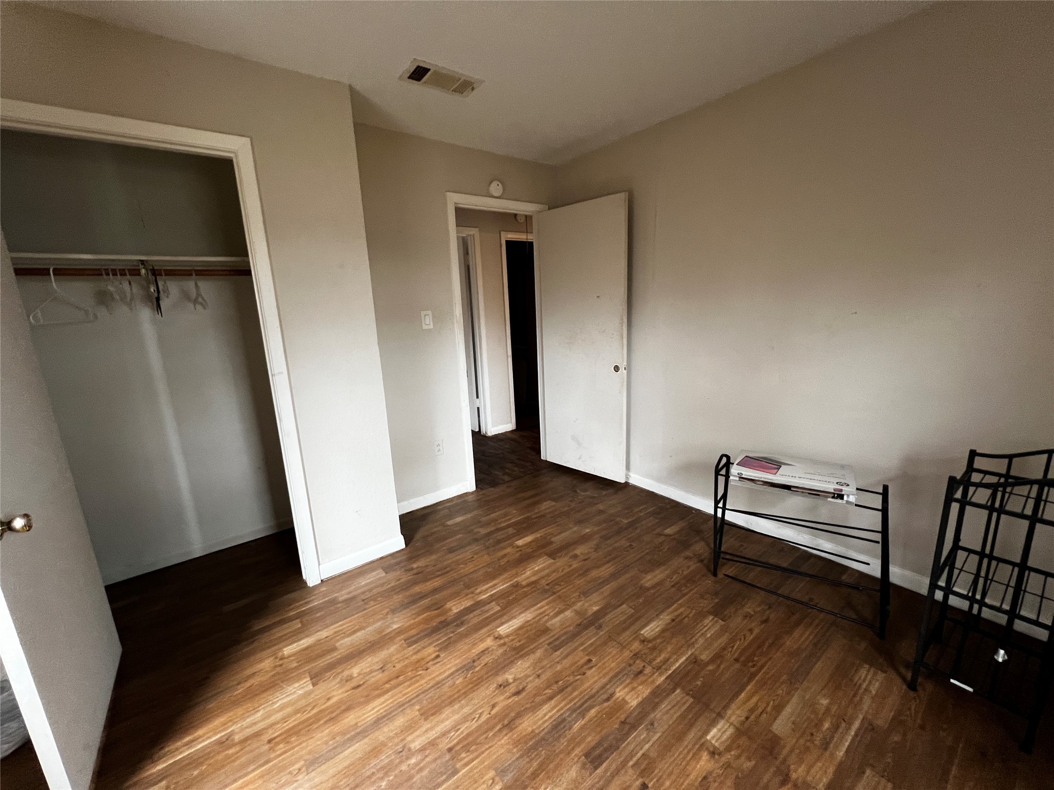 129 John Street Centerville, TX 75833 - Photo 11 of 15 wooden floor in an empty room