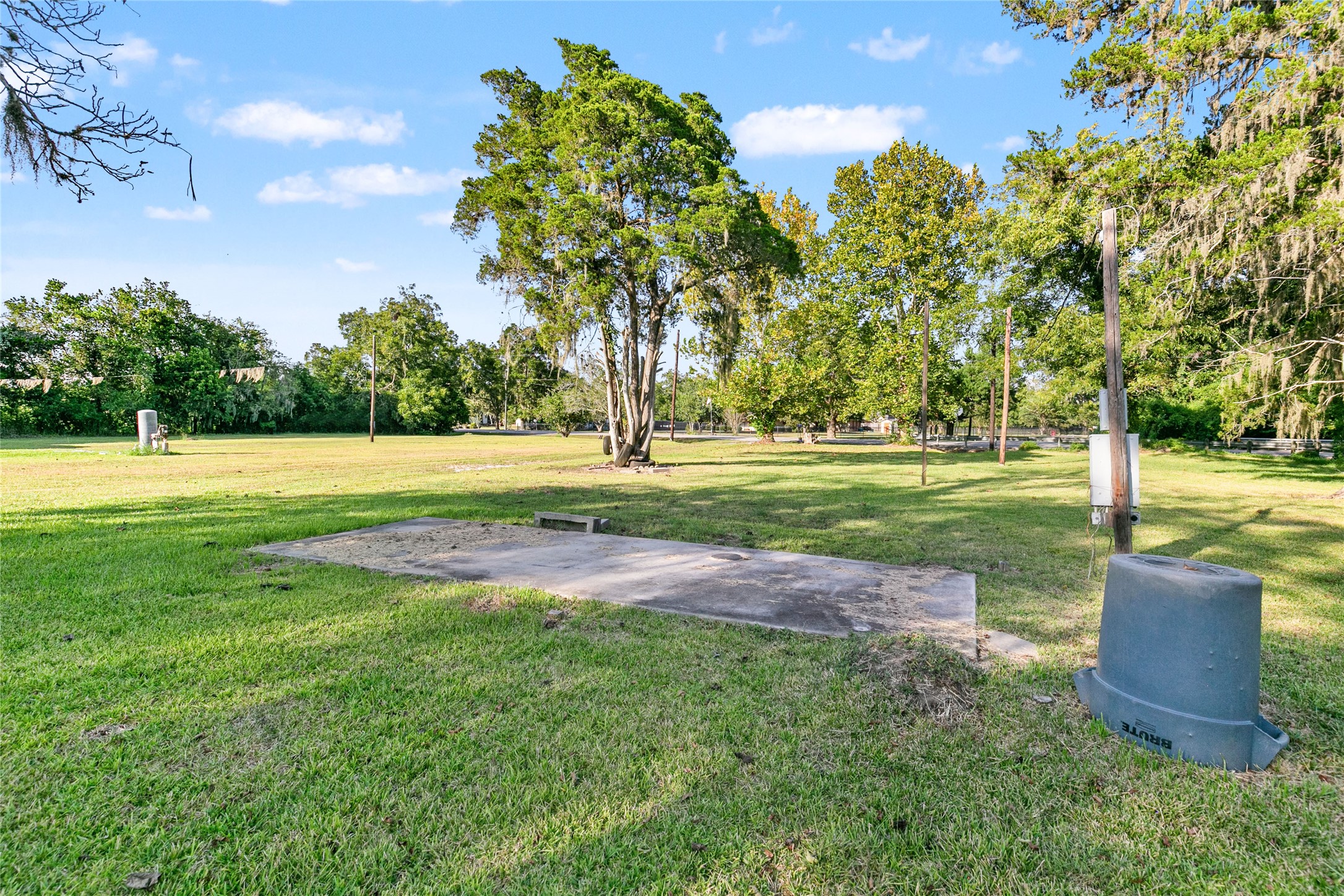 3014 Farm To Market 524 Road Sweeny, TX 77480 - Photo 11 of 18 A separate concrete RV/trailer pad has its own septic system, with a well shared between the pad and house. Two driveways and the layout provide natural separation between the two areas.