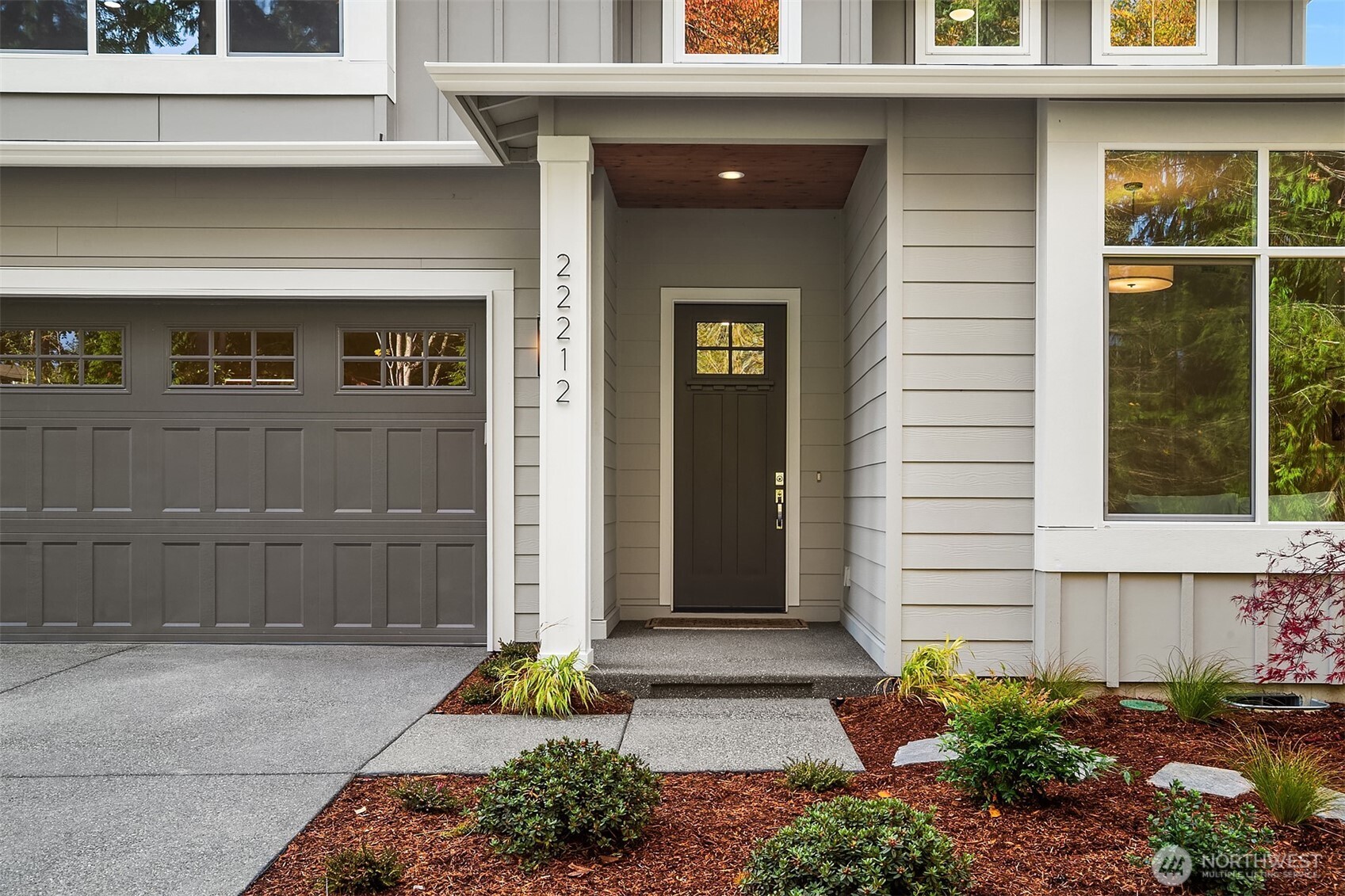22212 98th Avenue West Edmonds, WA 98020 - Photo 2 of 39 a front view of a house with a yard