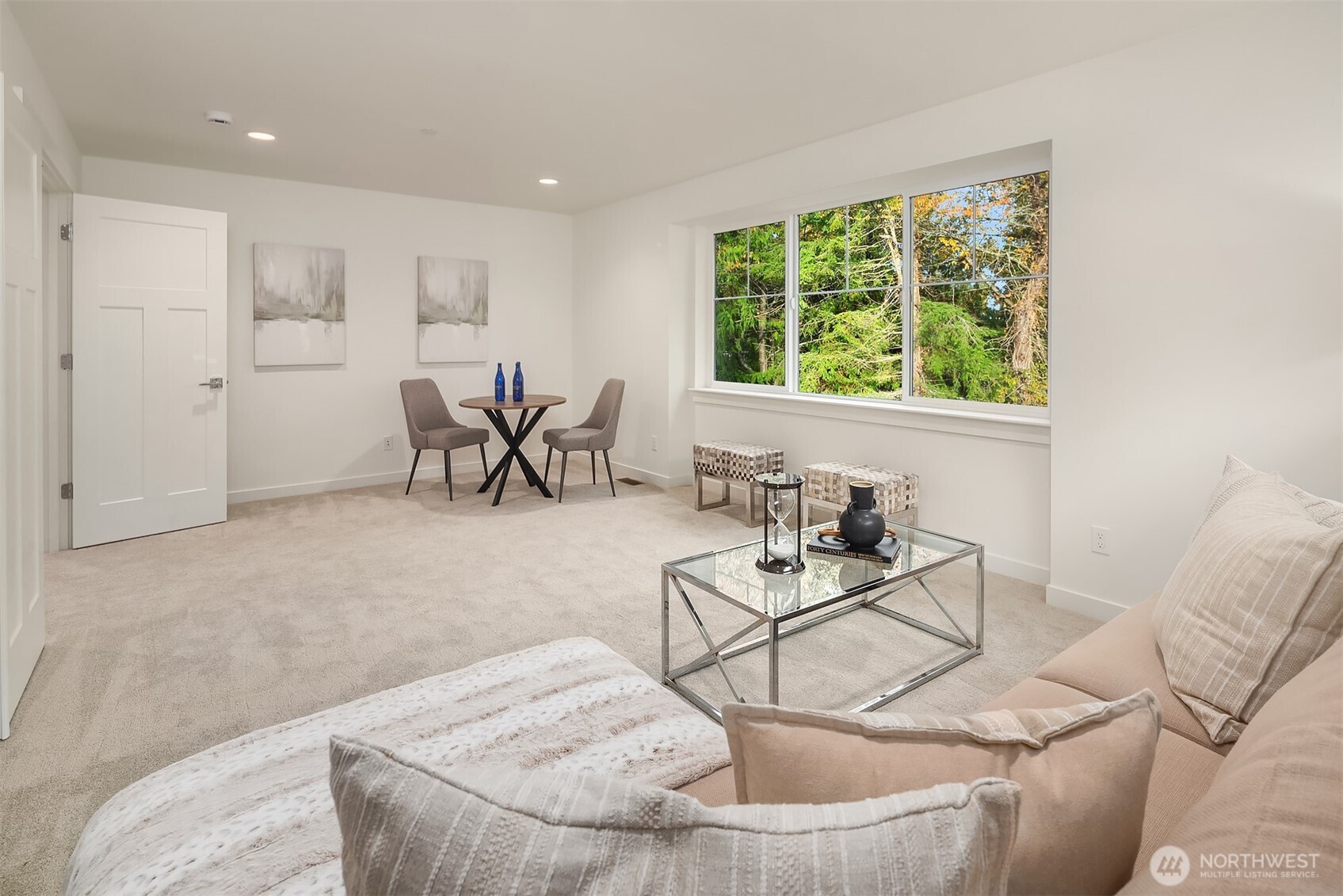 22212 98th Avenue West Edmonds, WA 98020 - Photo 24 of 39 a living room with furniture and a large window
