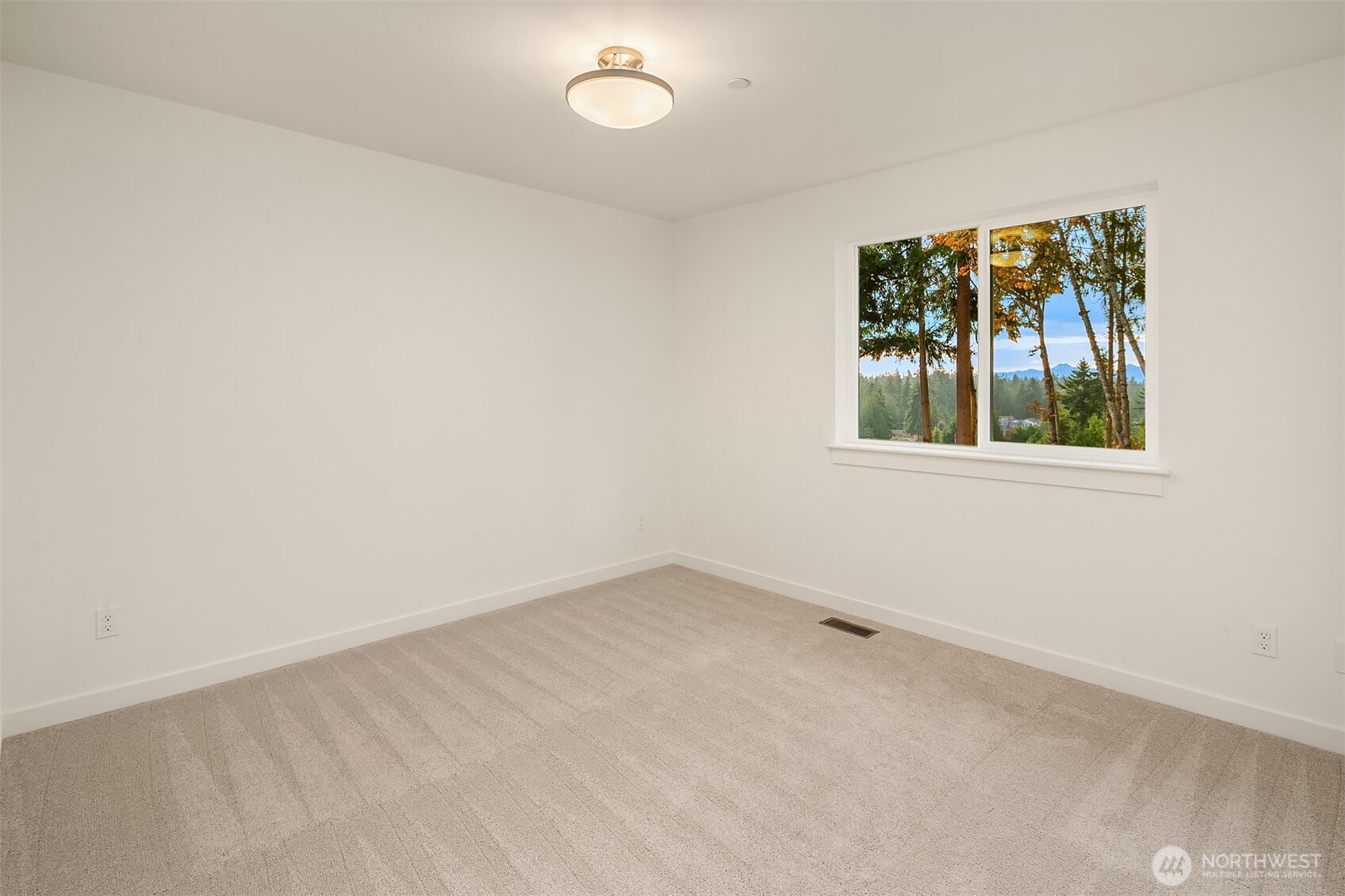 22212 98th Avenue West Edmonds, WA 98020 - Photo 31 of 39 an empty room with a window