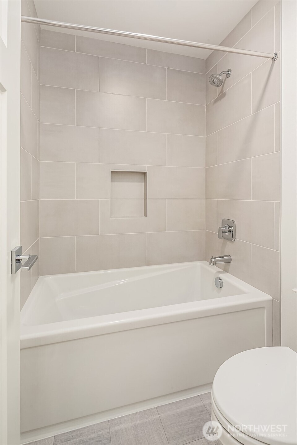 22212 98th Avenue West Edmonds, WA 98020 - Photo 34 of 39 a bathroom with a white bath tub and a shower