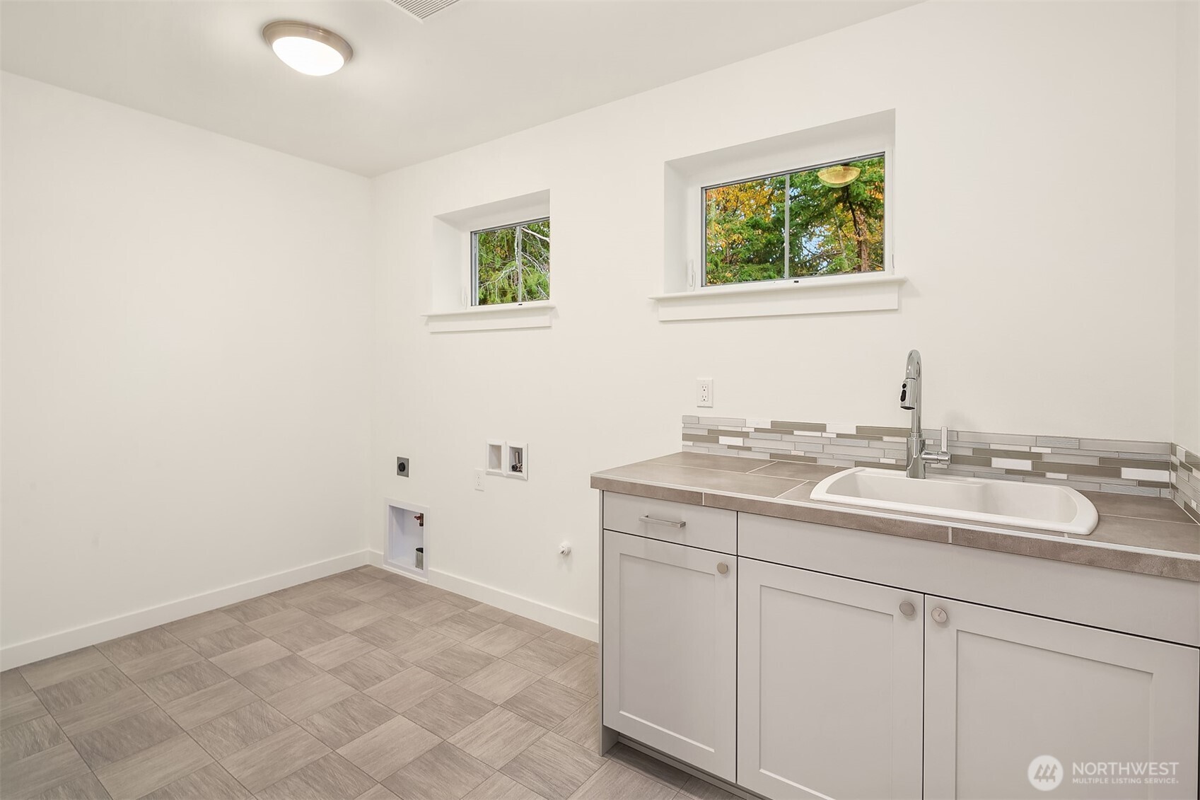 22212 98th Avenue West Edmonds, WA 98020 - Photo 36 of 39 a bathroom with a granite countertop sink and a