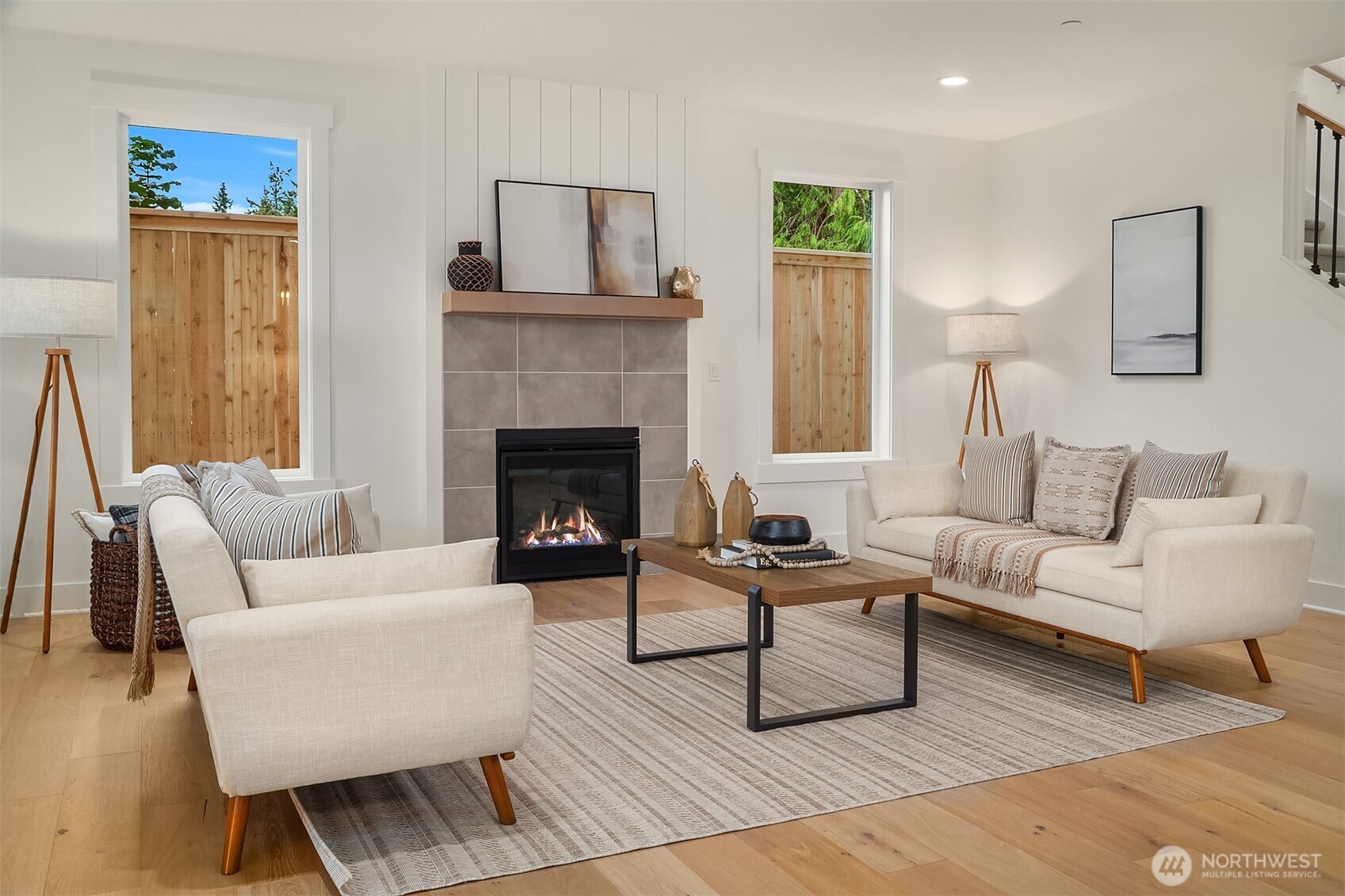 22212 98th Avenue West Edmonds, WA 98020 - Photo 6 of 39 a living room with furniture and a fireplace
