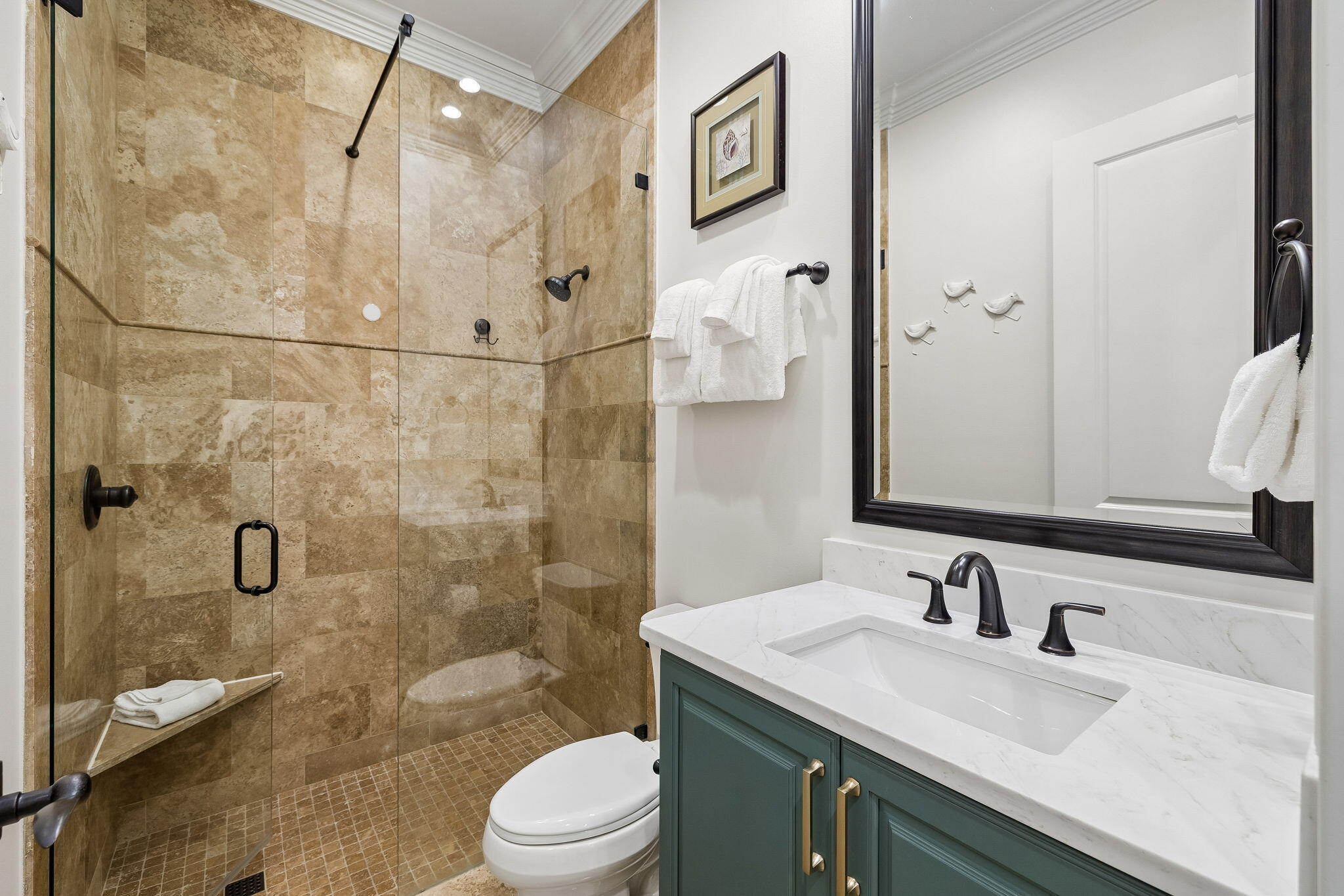 1973 Baytowne Loop Miramar Beach, FL 32550 - Photo 7 of 38 a bathroom with a granite countertop sink a toilet and shower