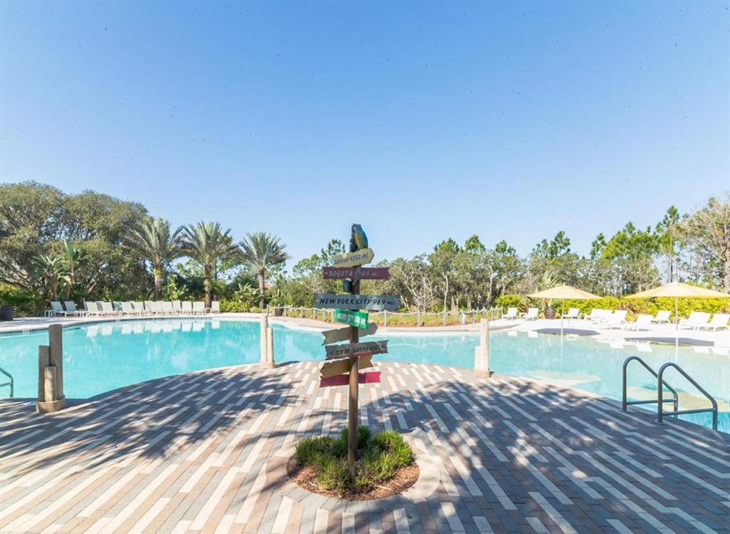 921 Conch Road Davenport, FL 33896 - Photo 16 of 21 a view of a lake and a yard