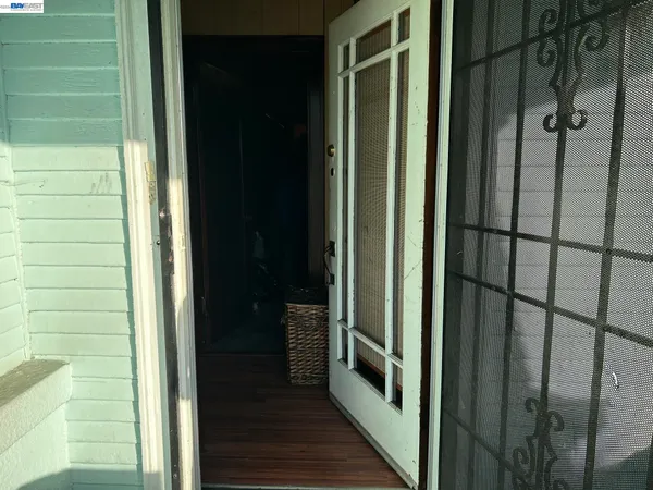 a view of a bathroom from a hallway