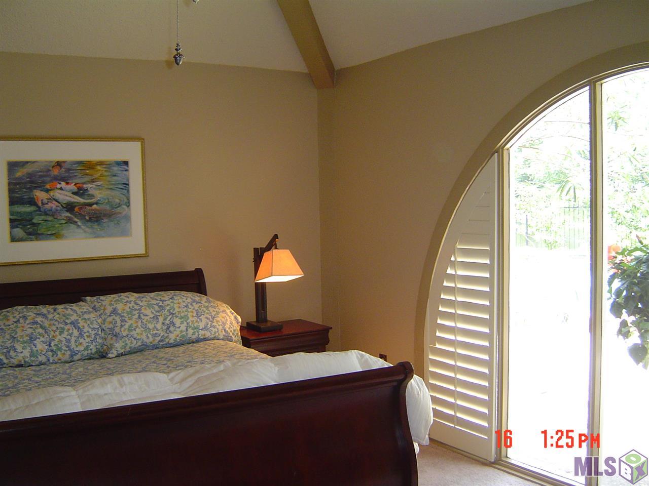 1615 Applewood Road Baton Rouge, LA 70808 - Photo 16 of 26 Master Bedroom Overlooking Pool