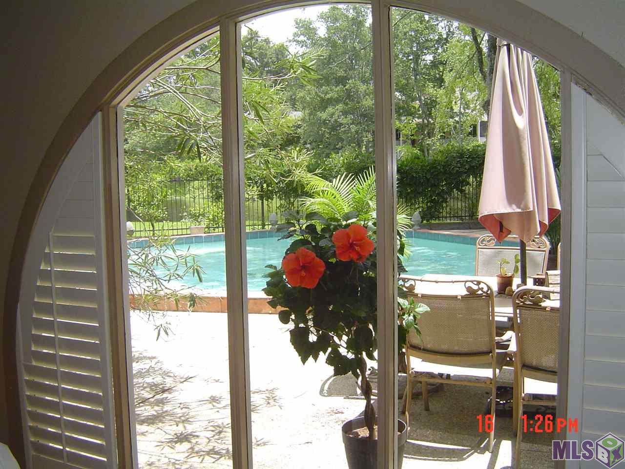 1615 Applewood Road Baton Rouge, LA 70808 - Photo 17 of 26 View out Arched Window