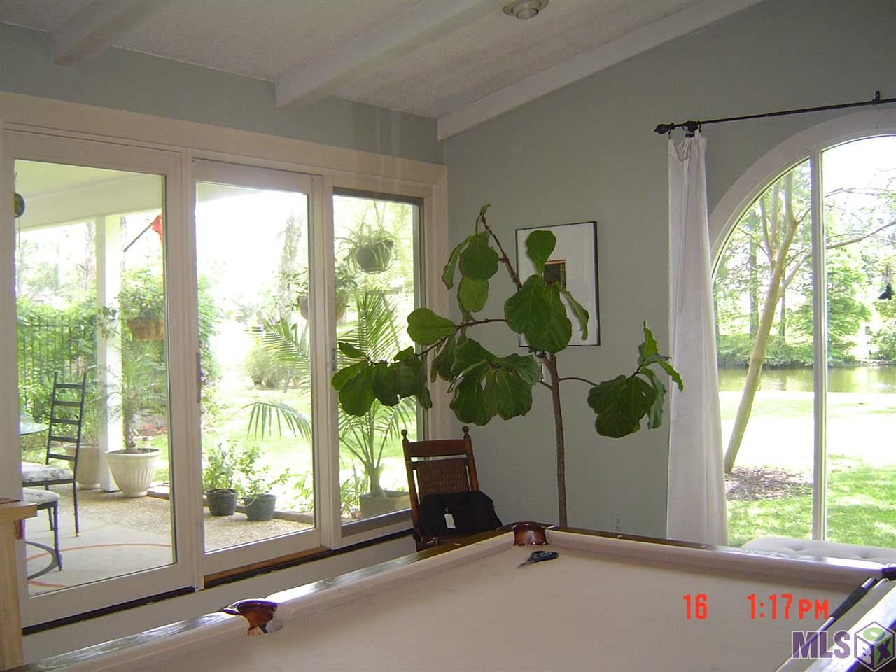 1615 Applewood Road Baton Rouge, LA 70808 - Photo 5 of 26 Den Overlooking Porch & Pool