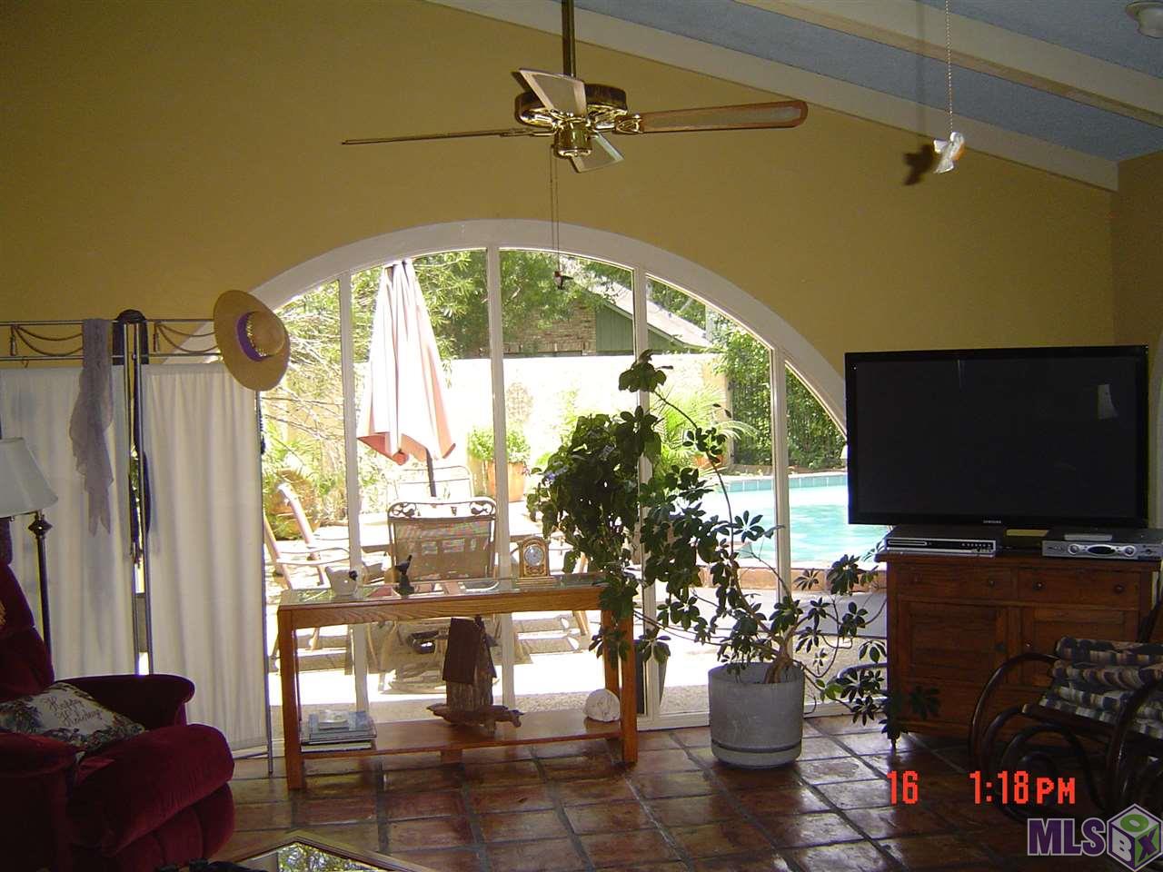 1615 Applewood Road Baton Rouge, LA 70808 - Photo 9 of 26 Sunroom with Pool View