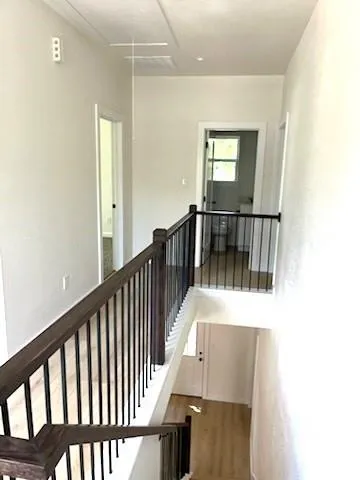 a view of entryway with wooden floor