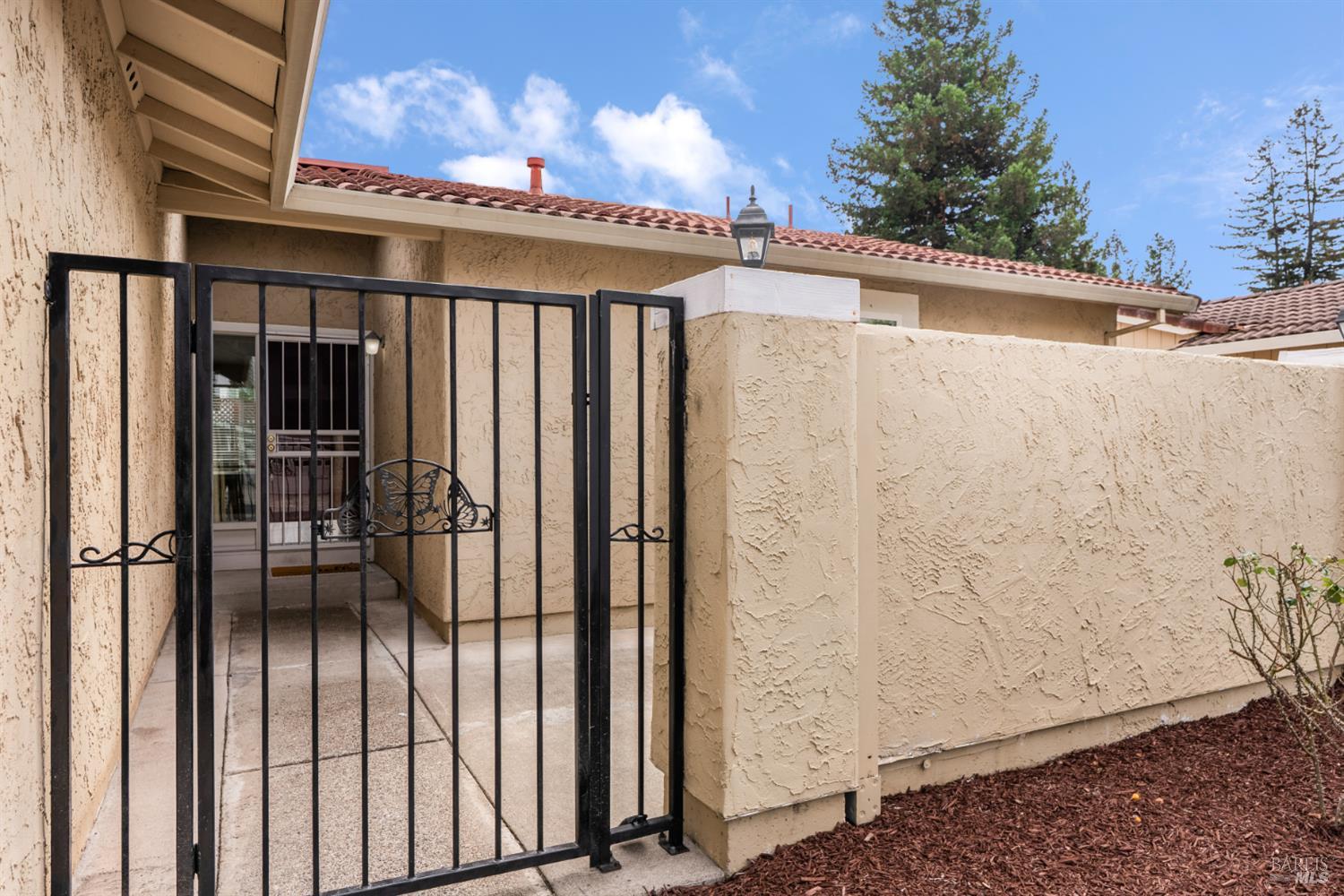 4984 Fern Place Rohnert Park, CA 94928 - Photo 5 of 37 A darling gated front entry welcomes you to the front courtyard.