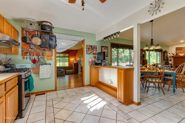 a view of a living room and workspace