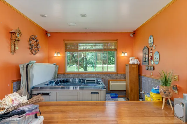 a kitchen with stainless steel appliances granite countertop a stove and a refrigerator