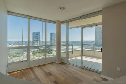 a view of an empty room and window