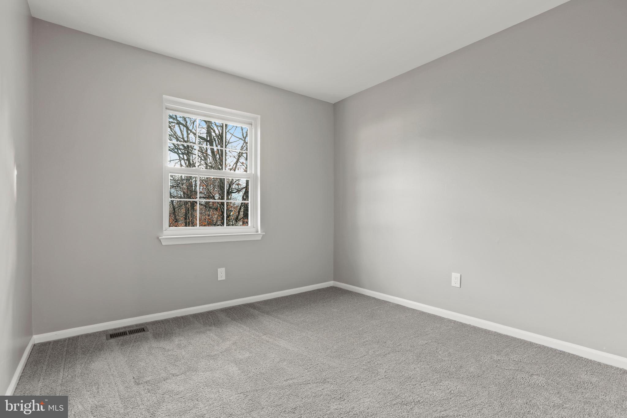 8617 Castlemill Circle Nottingham, MD 21236 - Photo 18 of 25 an empty room with a window