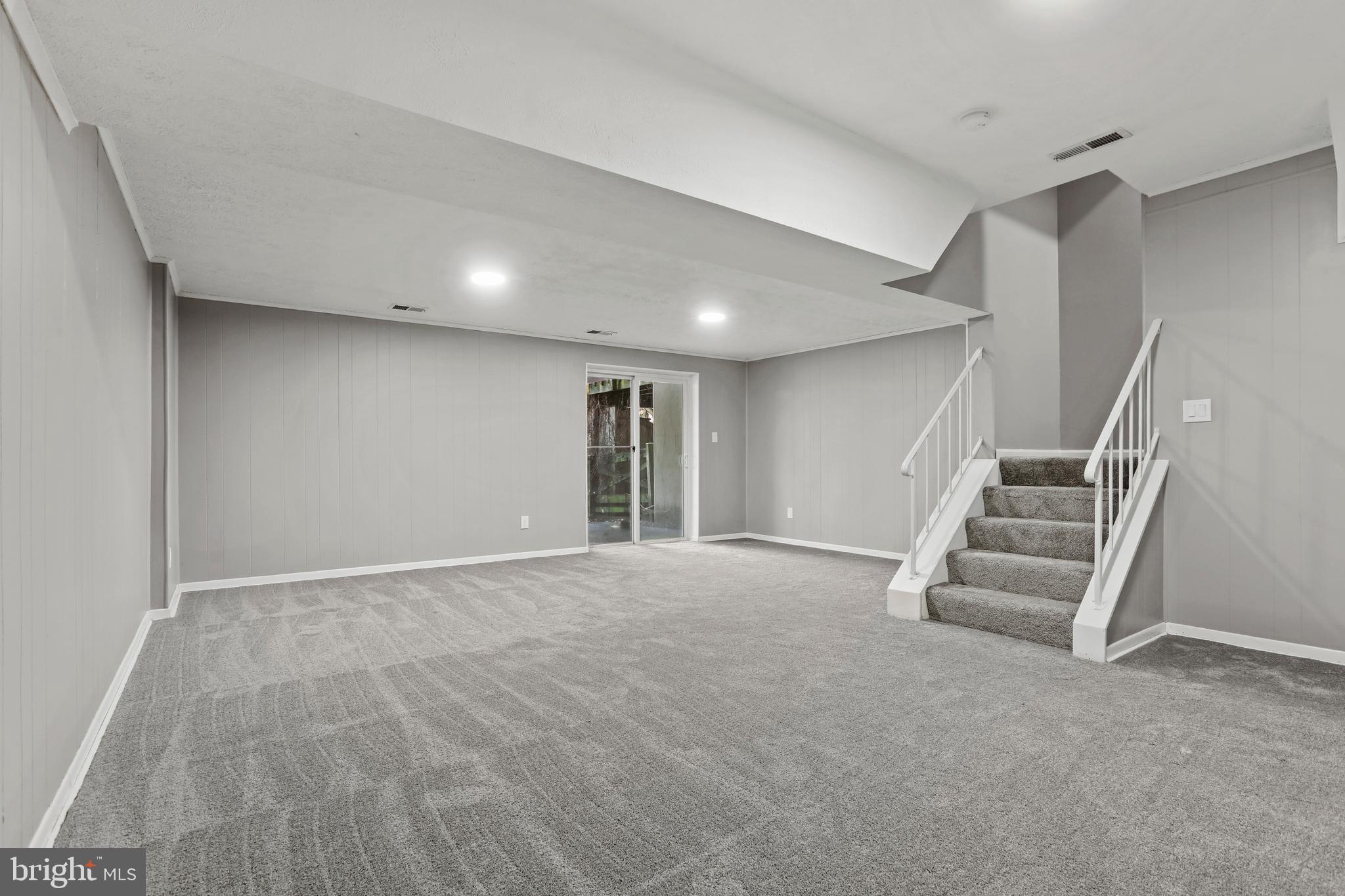 8617 Castlemill Circle Nottingham, MD 21236 - Photo 20 of 25 a view of an empty room with stairs