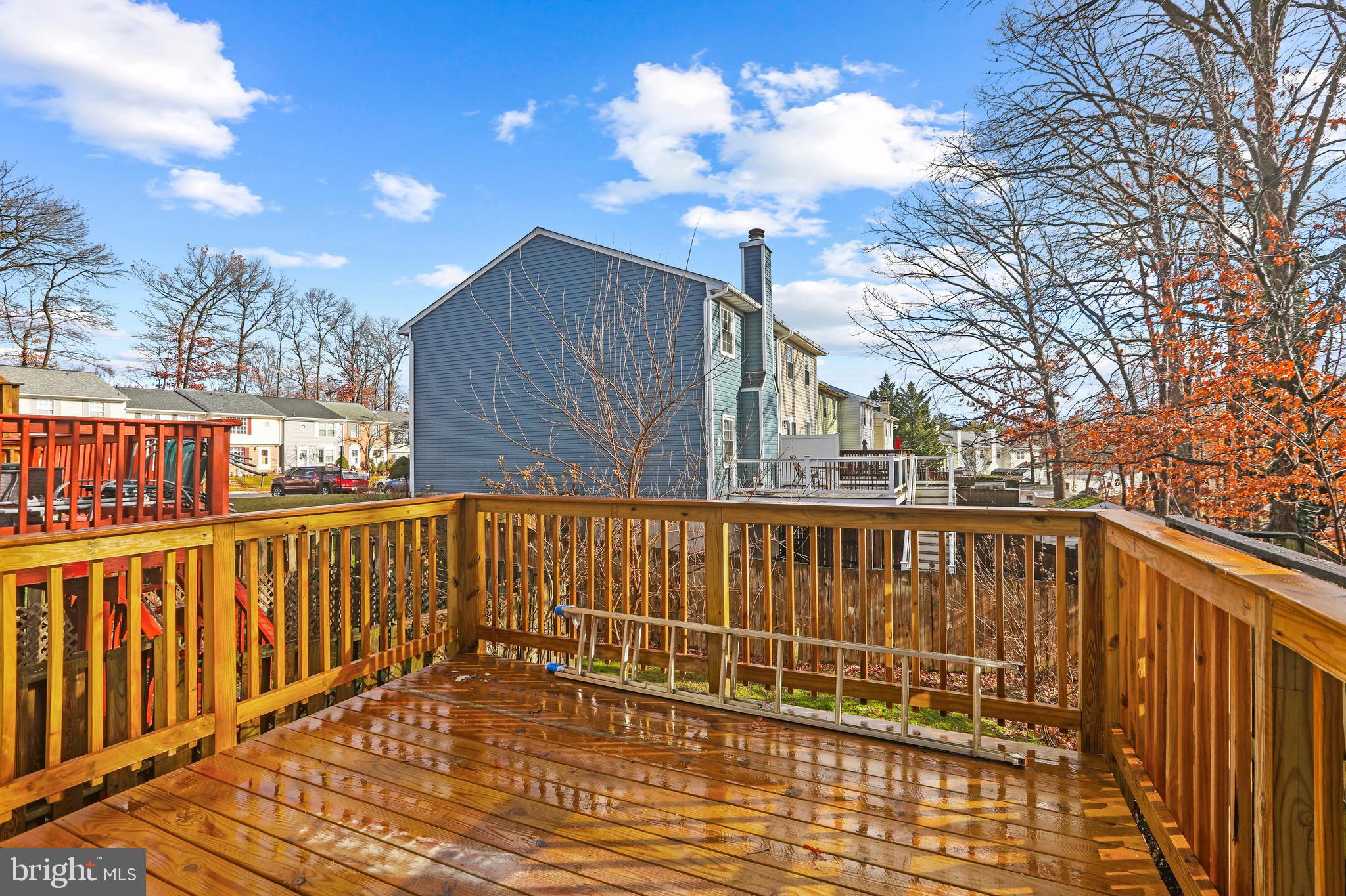 8617 Castlemill Circle Nottingham, MD 21236 - Photo 24 of 25 a view of a balcony with wooden floor and fence