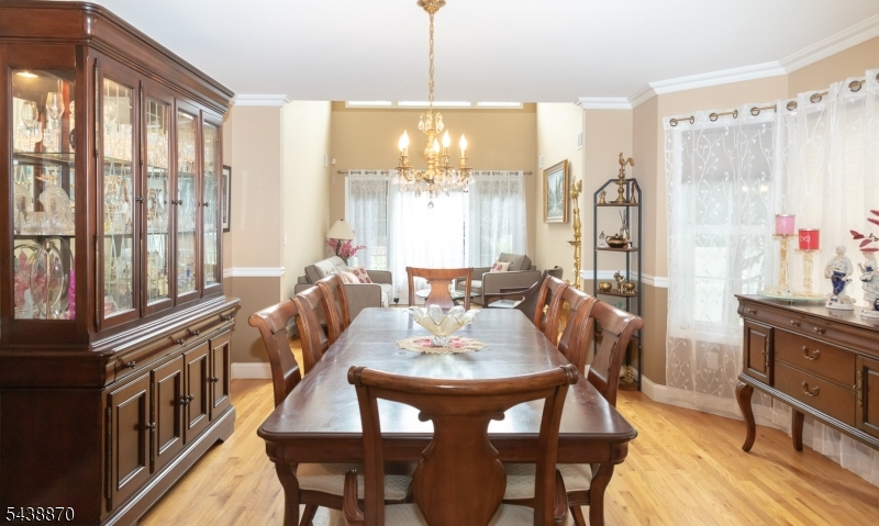 419 Putnam Road Union, NJ 07083 - Photo 9 of 37 a view of a dining room with furniture window and wooden floor
