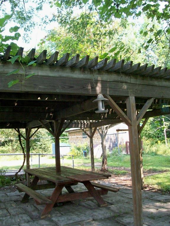 481 Pond Road Wales, ME 04280 - Photo 13 of 29 Pergola with Grapevines