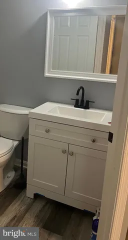 a bathroom with a sink and a toilet