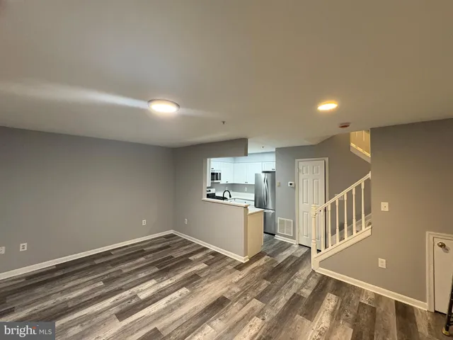 a view of a kitchen with a sink