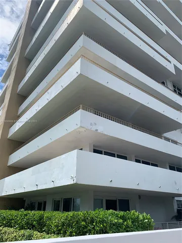 a white building with a outdoor space