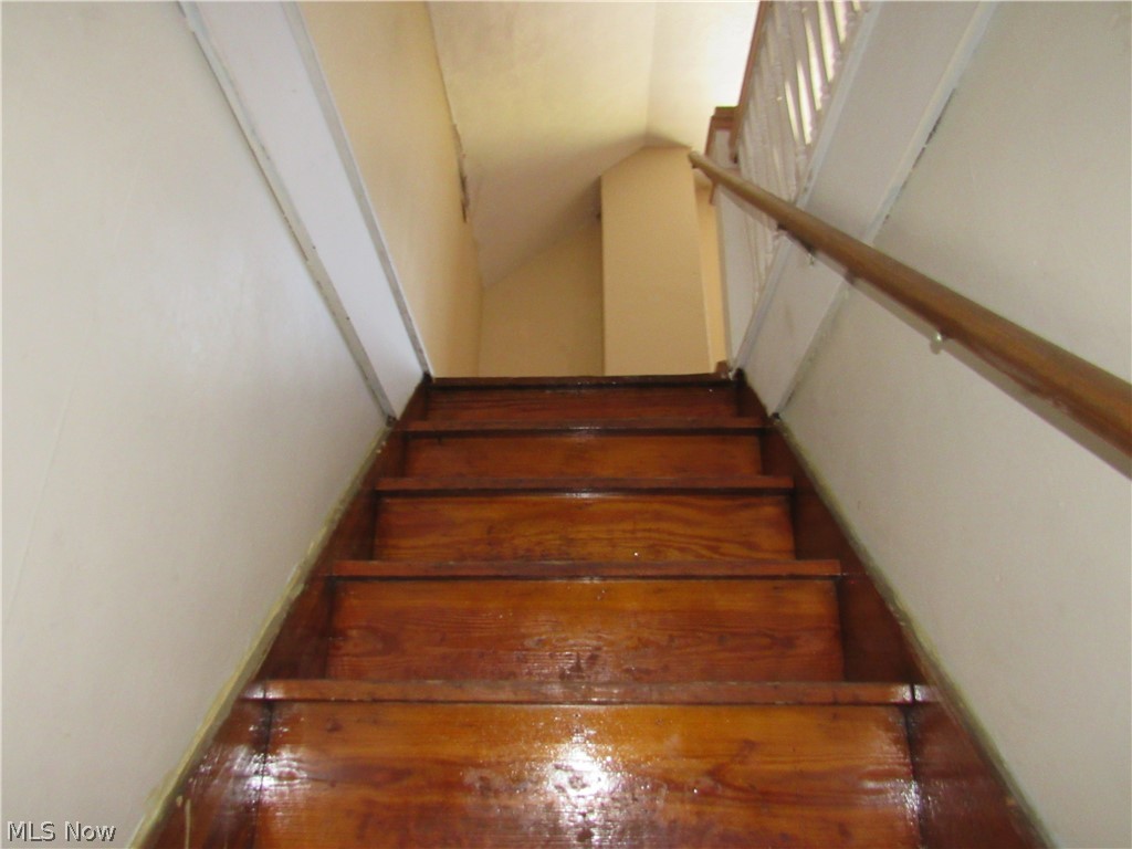 1726 Lee Road Cleveland Heights, OH 44118 - Photo 28 of 36 Wood-finish stair treads with a coordinating wood handrail