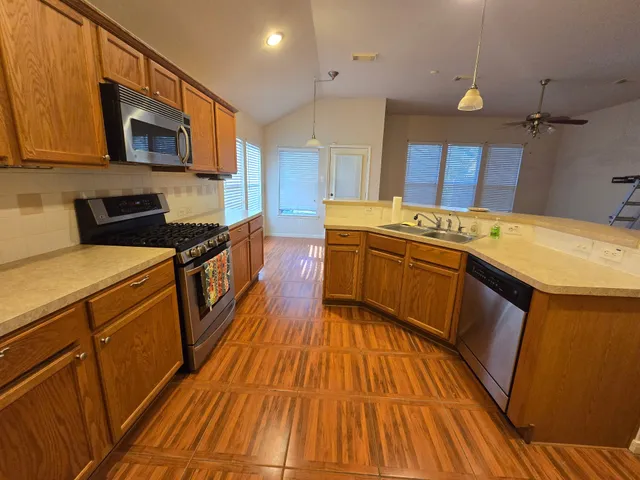 a bathroom with a glass door shower