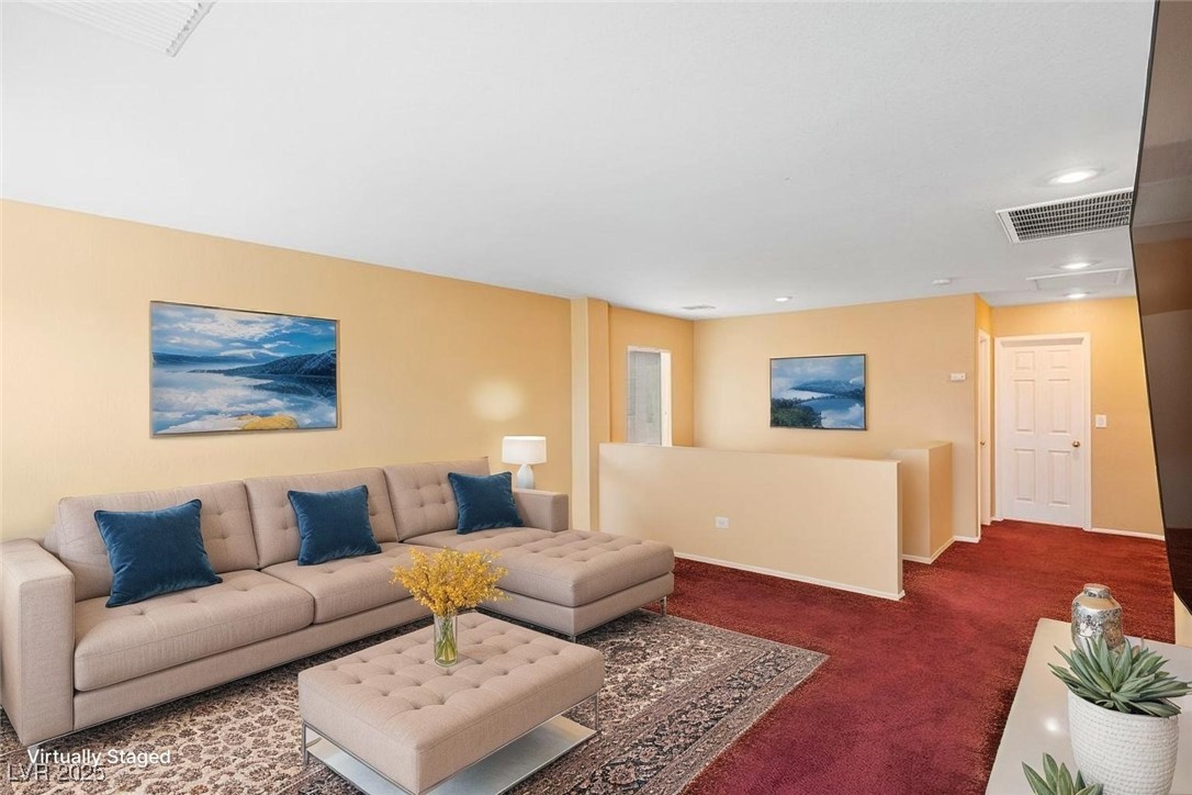 5033 Ropers Rock Court Las Vegas, NV 89131 - Photo 11 of 40 Carpeted living room with recessed lighting