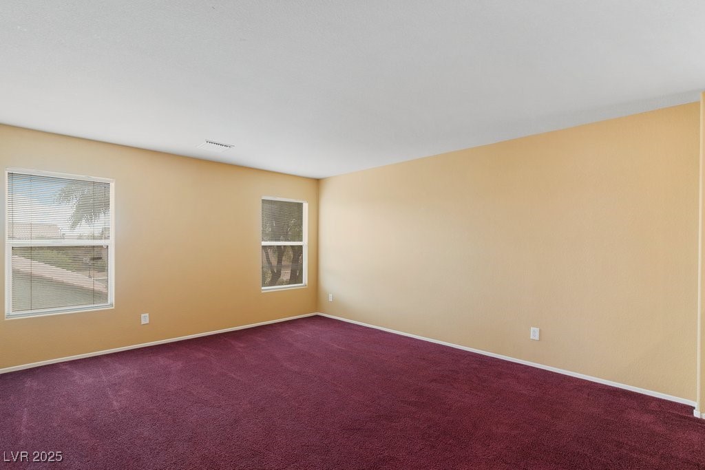 5033 Ropers Rock Court Las Vegas, NV 89131 - Photo 20 of 40 Spare room featuring carpet flooring and baseboards