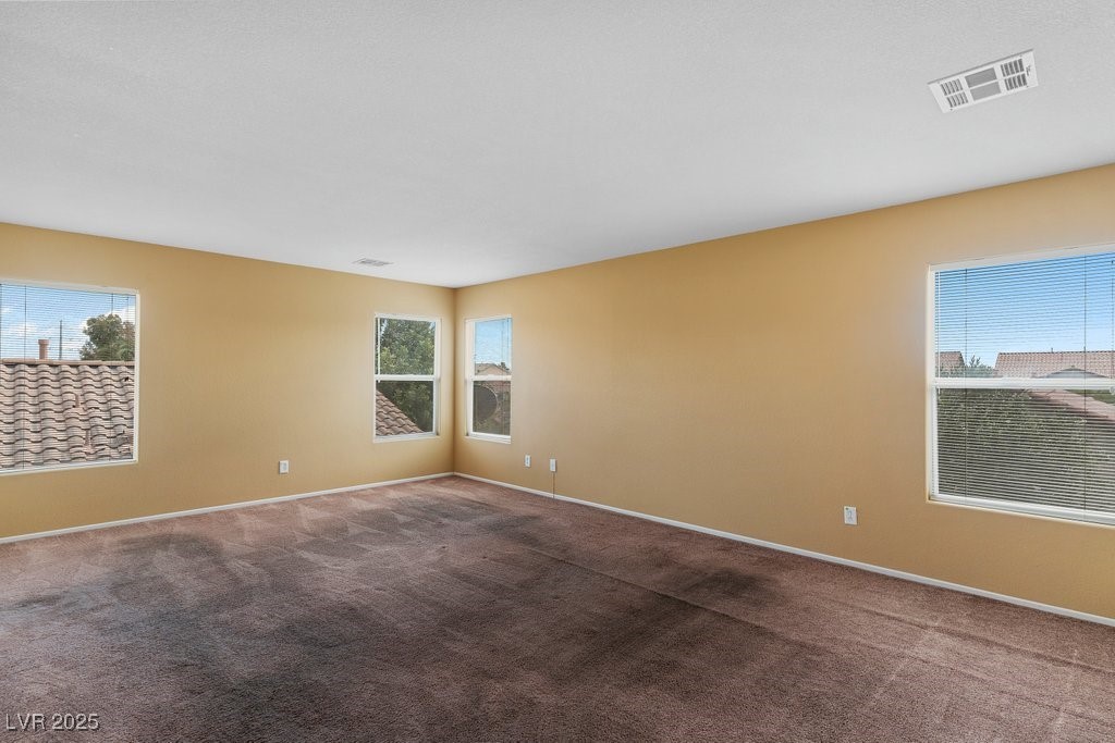 5033 Ropers Rock Court Las Vegas, NV 89131 - Photo 21 of 40 Carpeted empty room with baseboards