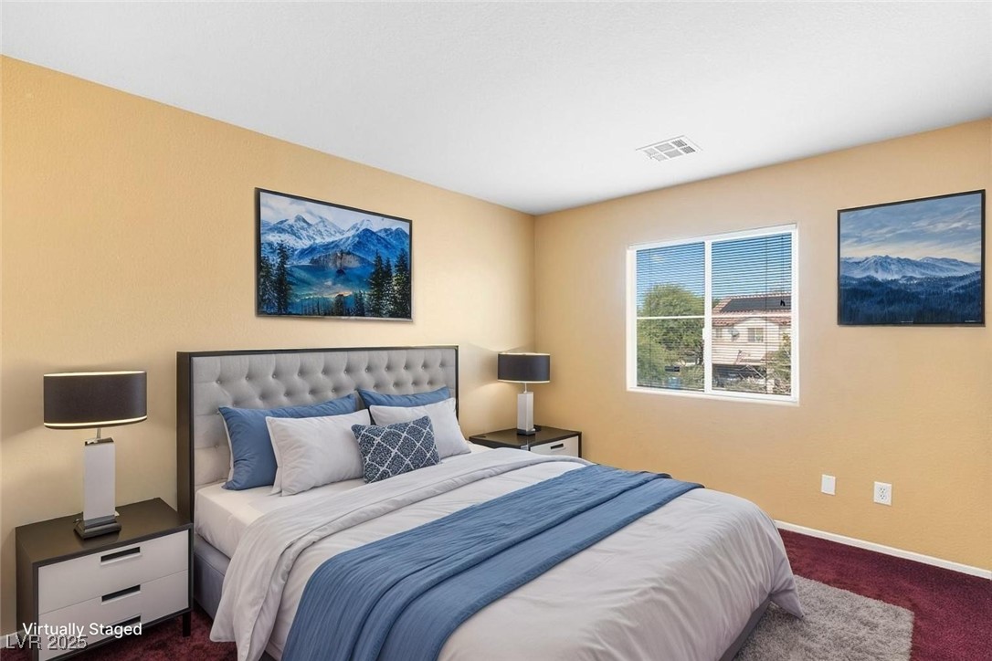 5033 Ropers Rock Court Las Vegas, NV 89131 - Photo 26 of 40 Bedroom featuring baseboards and dark carpet