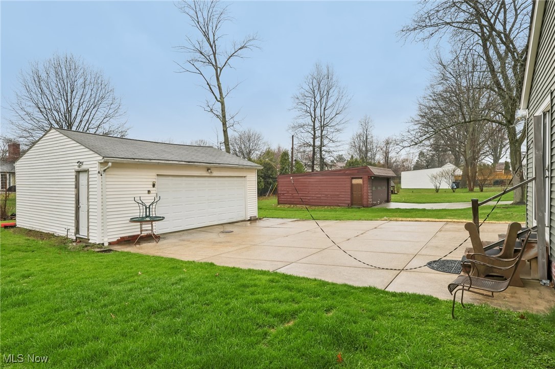 1768 Sunview Road Cleveland, OH 44124 - Photo 22 of 25 Large 2 car garage with plenty of additional storage space in lofted area