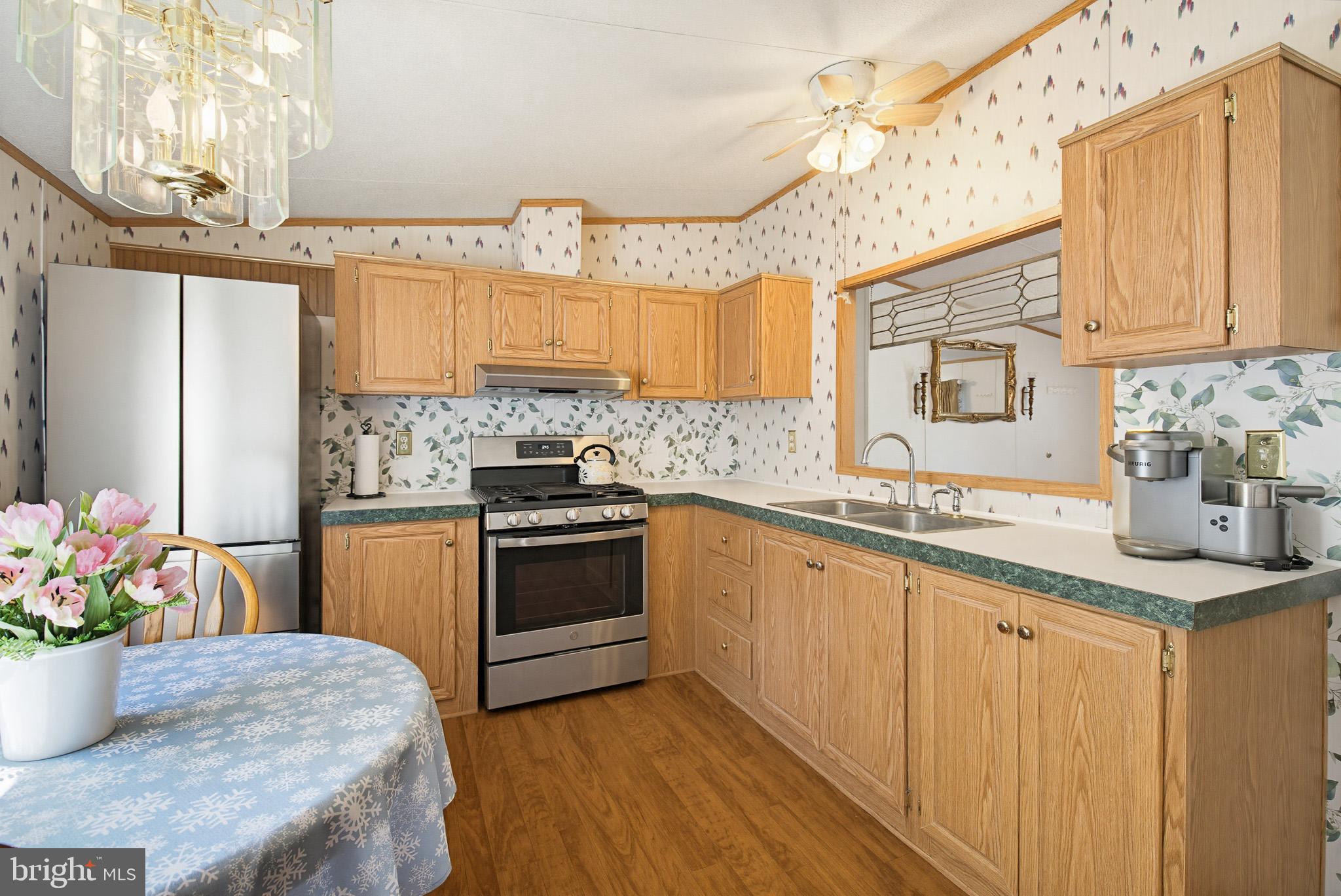 315 Lewis Road Annville, PA 17003 - Photo 17 of 33 a kitchen with stainless steel appliances granite countertop a sink stove and refrigerator