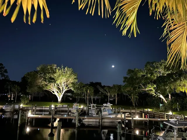 a view of dinning table and chairs in patio