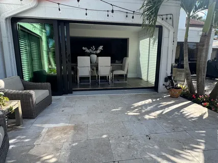 a view of a entryway door with a couch