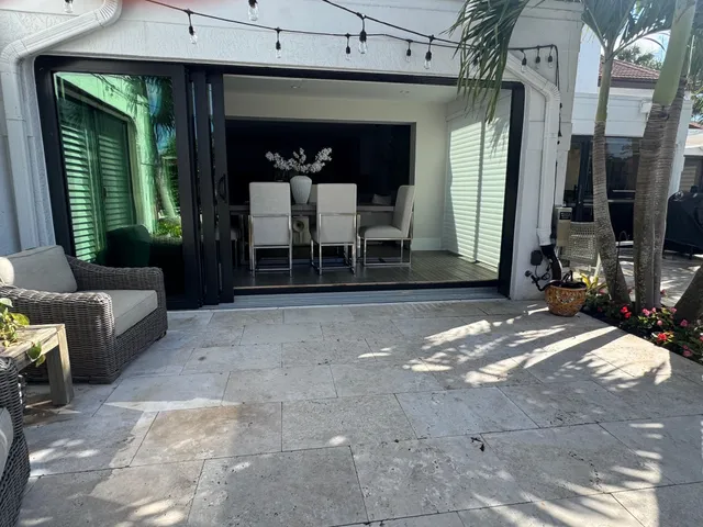 a view of a entryway door with a couch