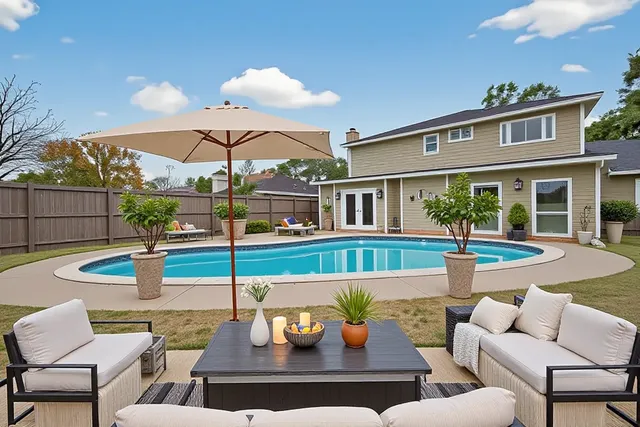 a view of a patio with swimming pool